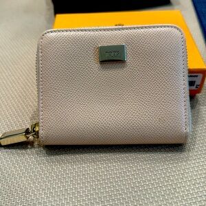 Tod’s zip around pink wallet